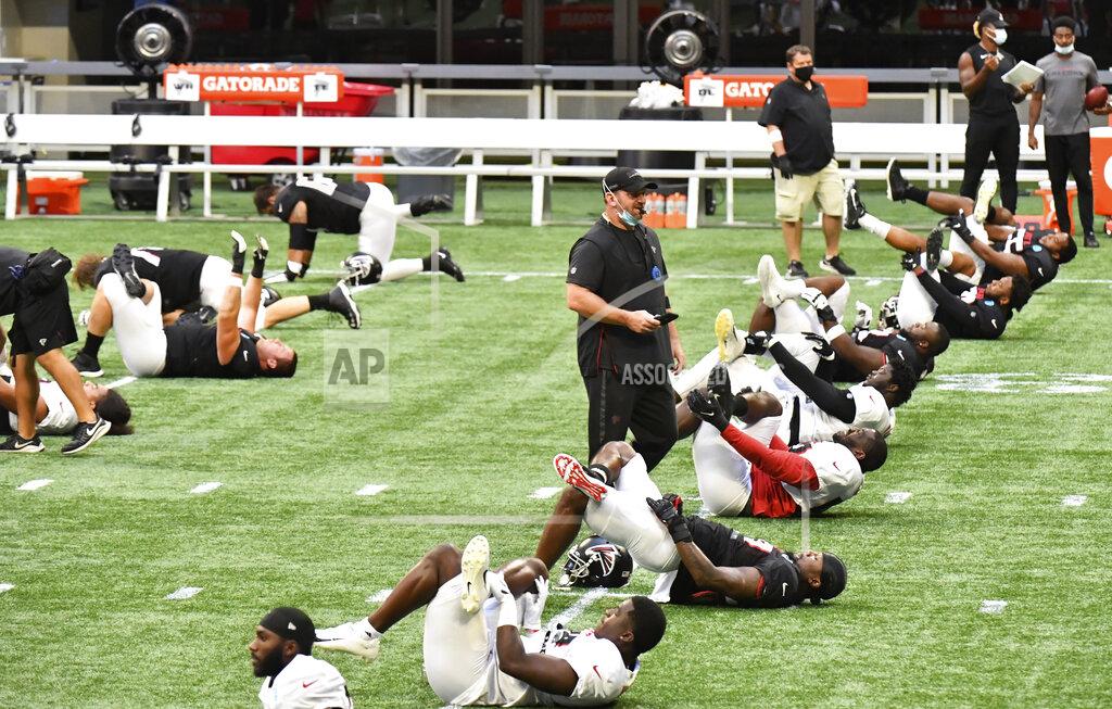 Hyosub Shin Atlanta Falcons stretch before practice during NFL football training camp Thursday, Sept. 3, 2020, in Atlanta. (Hyosub Shin/Atlanta Journal-Constitution via AP)