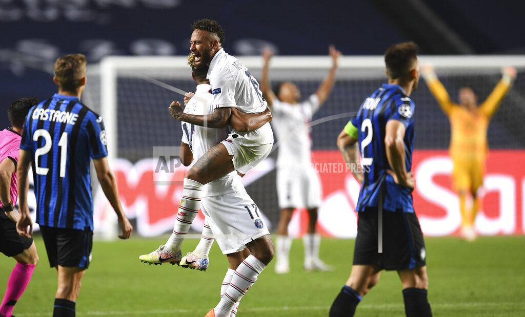 David Ramos PSG's Neymar celebrates with teammate Eric Maxim Choupo-Moting after his team's win in the Champions League quarterfinal match between Atalanta and PSG at Luz stadium, Lisbon, Portugal, Wednesday, Aug. 12, 2020. (David Ramos/Pool Photo via AP)