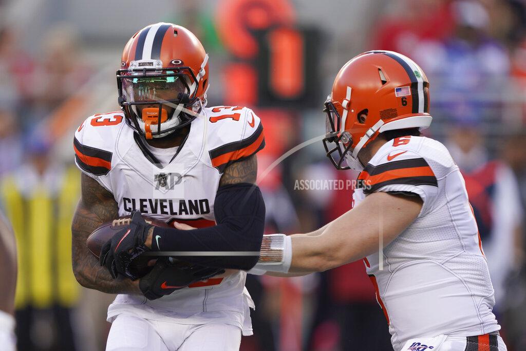 Tony Avelar FILE - In this Monday, Oct. 7, 2019, file photo, Cleveland Browns wide receiver Odell Beckham Jr. (13) takes a handoff from quarterback Baker Mayfield (6) during the first half of an NFL football game against the San Francisco 49ers in Santa Clara, Calif. Beckham believes the Browns offense will come around. Until then, he’s going to defend Mayfield. (AP Photo/Tony Avelar, File)