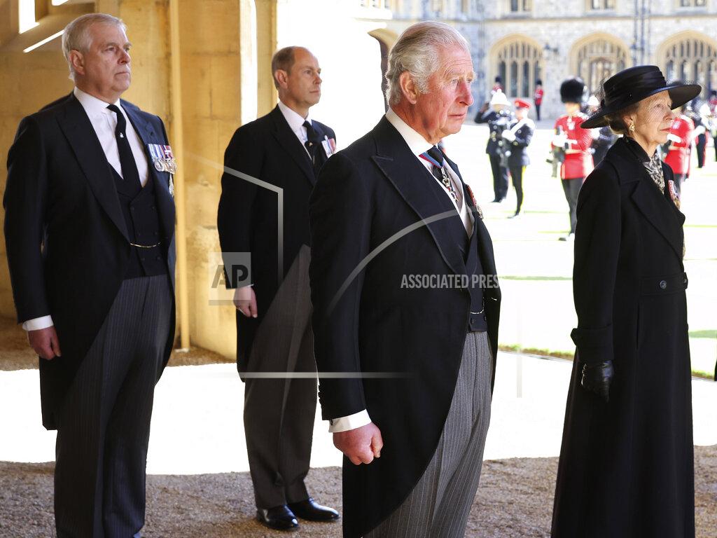 Chris Jackson From left, Prince Andrew, Prince Edward, Prince Charles and Princess Anne arrive after walking in a procession behind the coffin of Prince Philip, with other members of the Royal family during the funeral of Britain's Prince Philip inside Windsor Castle in Windsor, England, Saturday, April 17, 2021. Prince Philip died April 9 at the age of 99 after 73 years of marriage to Britain's Queen Elizabeth II. (Chris Jackson/Pool via AP)