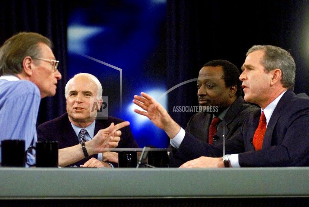 Eric Draper FILE - In this Feb. 15, 2000 file photo, Larry King, host of CNN's Larry King Live, asks a question to the Republican presidential candidates, from left, Sen. John McCain, Alan Keyes, and Gov. George W. Bush of Texas, during the Republican presidential debate in Columbia, S.C. King, who interviewed presidents, movie stars and ordinary Joes during a half-century in broadcasting, has died at age 87. Ora Media, the studio and network he co-founded, tweeted that King died Saturday, Jan. 23, 2021 morning at Cedars-Sinai Medical Center in Los Angeles. (AP Photo/Eric Draper, Pool)