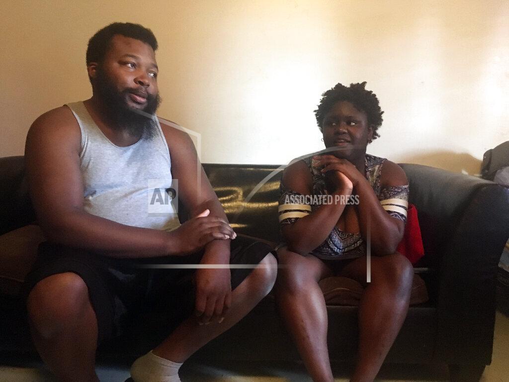Russell Contreras FILE - In this May 9, 2018, file photo, Travis Johnson, 27, and his girlfriend, Chanika Green, 18, sit in this Shelby, Miss., apartment and talk with the nonprofit group Save the Children about their community's fight against poverty. A Save the Children report released Tuesday, June 2, 2020, says childhood disparities around malnutrition, graduation rates, and early deaths are worst in the U.S. among rural, black-majority counties in the American South and isolated counties with Native American populations. (AP Photo/Russell Contreras, File)