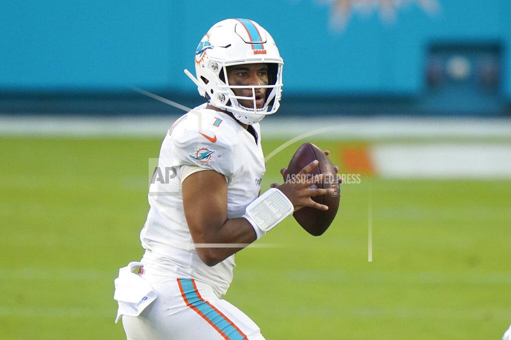Wilfredo Lee Miami Dolphins quarterback Tua Tagovailoa (1) looks to pass the ball during the second half of an NFL football game against the Los Angeles Rams, Sunday, Nov. 1, 2020, in Miami Gardens, Fla. (AP Photo/Wilfredo Lee)