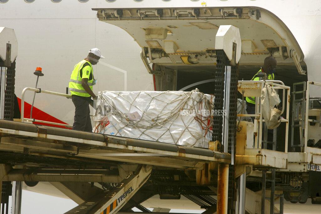 Diomande Ble Blonde A shipment of COVID-19 vaccines distributed by the COVAX Facility arrives in Abidjan, Ivory Coast, Friday Feb. 25, 2021. Ivory Coast is the second country in the world after Ghana to receive vaccines acquired through the United Nations-backed COVAX initiative with a delivery of 504,000 doses of the AstraZeneca vaccine made by the Serum Institute of India. (AP Photo/ Diomande Ble Blonde)
