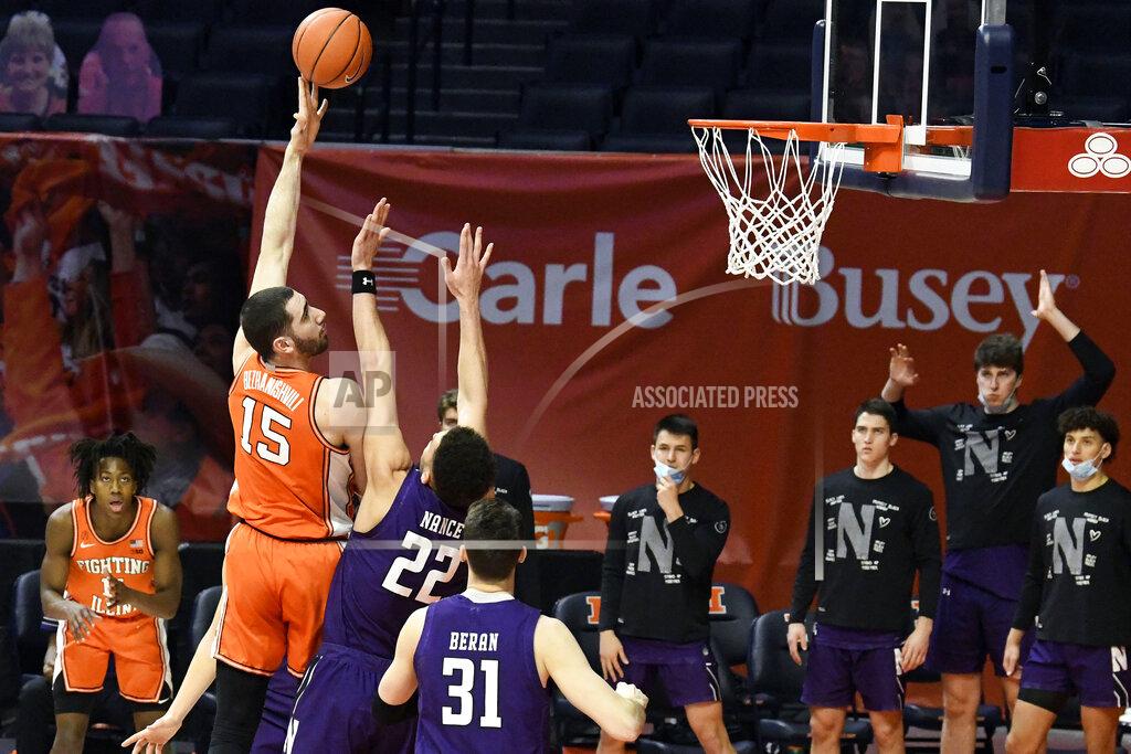 Holly Hart Illinois forward Giorgi Bezhanishvili (15) puts up a shot against Northwestern in the first half of an NCAA college basketball game Tuesday, Feb. 16, 2021, in Champaign, Ill. (AP Photo/Holly Hart)