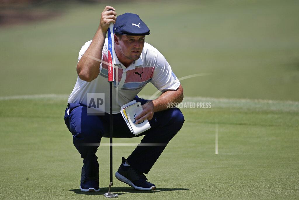 Gerry Broome Bryson DeChambeau lines up a shot on the first green during the final round of the RBC Heritage golf tournament, Sunday, June 21, 2020, in Hilton Head Island, S.C. (AP Photo/Gerry Broome)
