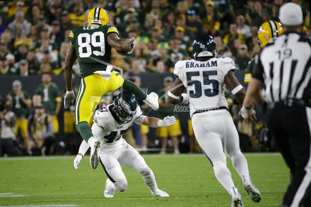 Mike Roemer Green Bay Packers tight end Marcedes Lewis hurdles the defense of Philadelphia Eagles linebacker Nate Gerry during the first half of an NFL football game Thursday, Sept. 26, 2019, in Green Bay, Wis. (AP Photo/Mike Roemer)