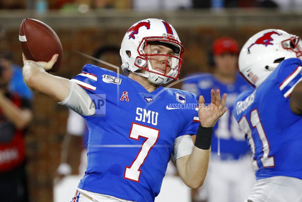 Roger Steinman FILE - In this Oct. 5, 2019, file photo, SMU quarterback Shane Buechele throws a pass during the first half of an NCAA college football game against Tulsa, in Dallas, Texas. Buechele is the starting quarterback for an undefeated Top 25 team, like so many people envisioned when he started 12 games as a true freshman for Texas. Except Buechele is now close to home after going to No. 19 SMU as a graduate transfer. (AP Photo/Roger Steinman, File)