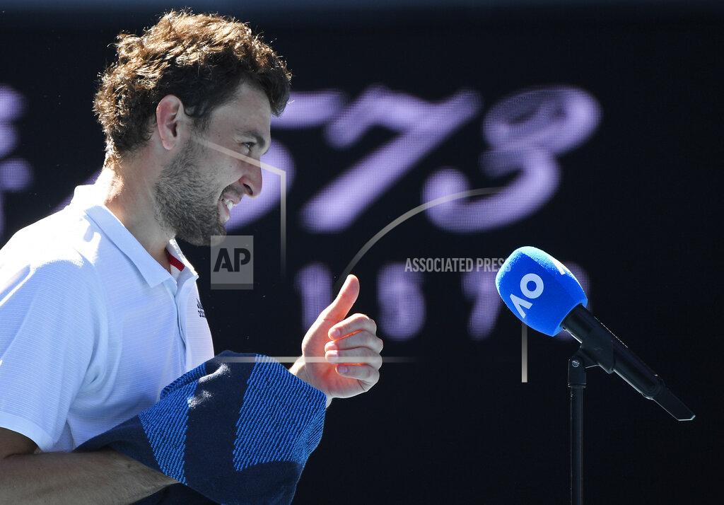 Andy Brownbill Russia's Aslan Karatsev is interviewed after his win over Canada's Felix Auger-Aliassime in their fourth round match at the Australian Open tennis championships in Melbourne, Australia, Sunday, Feb. 14, 2021. The Australian Open continues but without crowds after the Victoria state government imposed a five-day lockdown in response to a COVID-19 outbreak at a quarantine hotel. (AP Photo/Andy Brownbill)