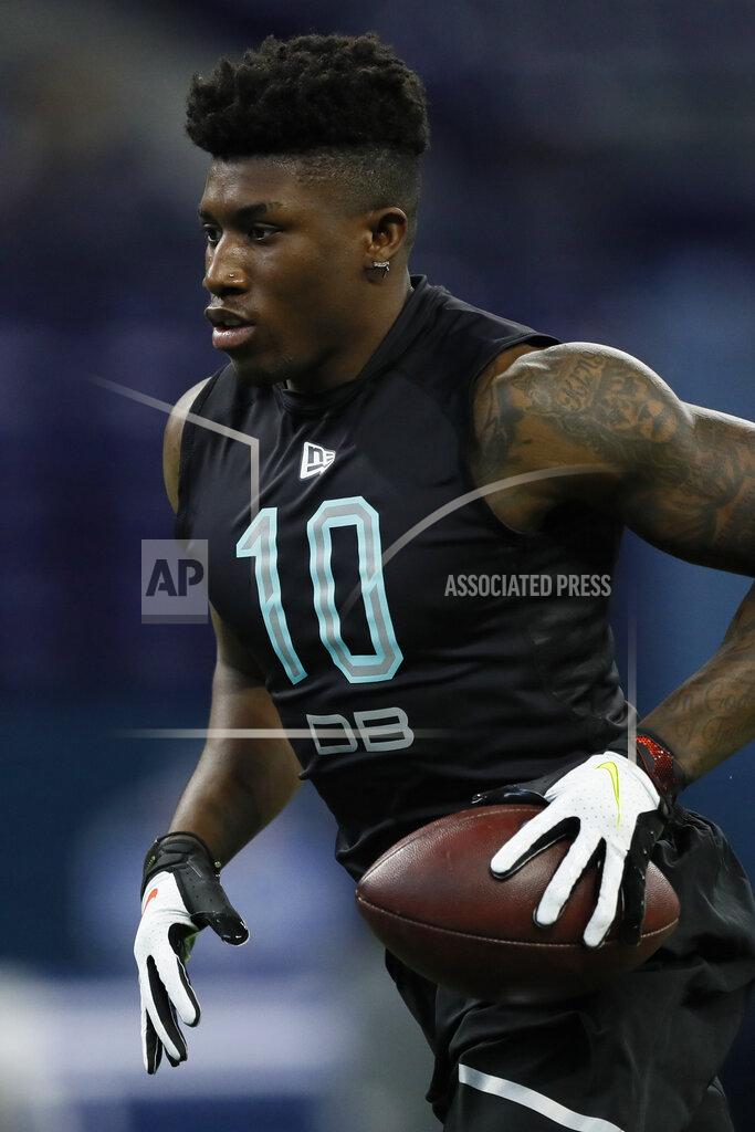 FILE - In this March 1, 2020, file photo, TCU defensive back Jeff Gladney runs a drill at the NFL football scouting combine in Indianapolis. First-round draft pick Jeff Gladney will be the latest young cornerback to be challenged by Minnesota Vikings coach Mike Zimmer, whose tough-love teaching has helped develop several solid pros at his pet position. (AP Photo/Charlie Neibergall, File)