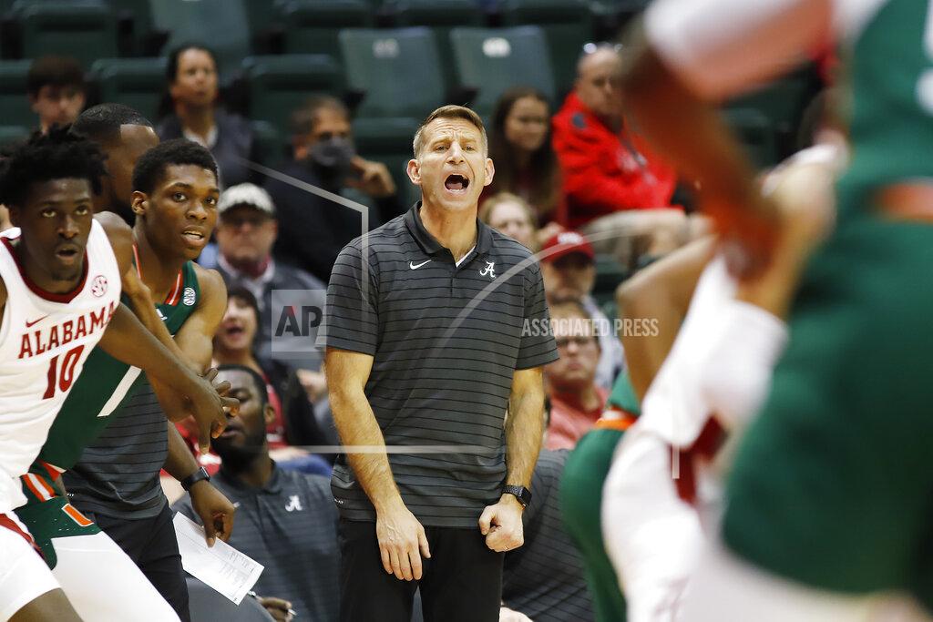 Jacob M. Langston Alabama head coach Nate Oats yells to his team during the first half of an NCAA college basketball game against Miami on Sunday, Nov. 28, 2021, in Lake Buena Vista, Fla. (AP Photo/Jacob M. Langston)