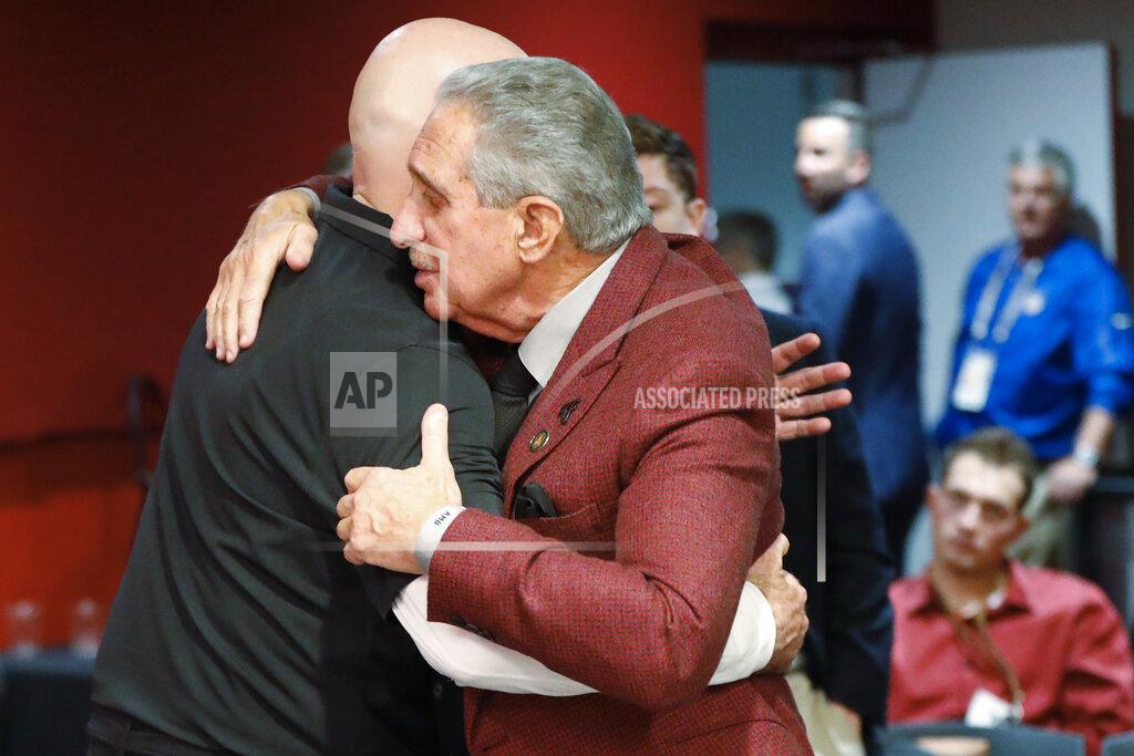 John Bazemore Atlanta Falcons owner Arthur Blank, right, embraces Falcons head coach Dan Quinn after an NFL football game against the Seattle Seahawks, Sunday, Oct. 27, 2019, in Atlanta. Atlanta coach Dan Quinn has been fired after the Falcons dropped to 0-5 for the first time since 1997. The move came just hours after the Falcons lost to the Carolina Panthers 23-16, Sunday, Oct. 11, 2020. The team also fired longtime general manager Thomas Dimitroff, who had been with the team since 2008. (AP Photo/John Bazemore)
