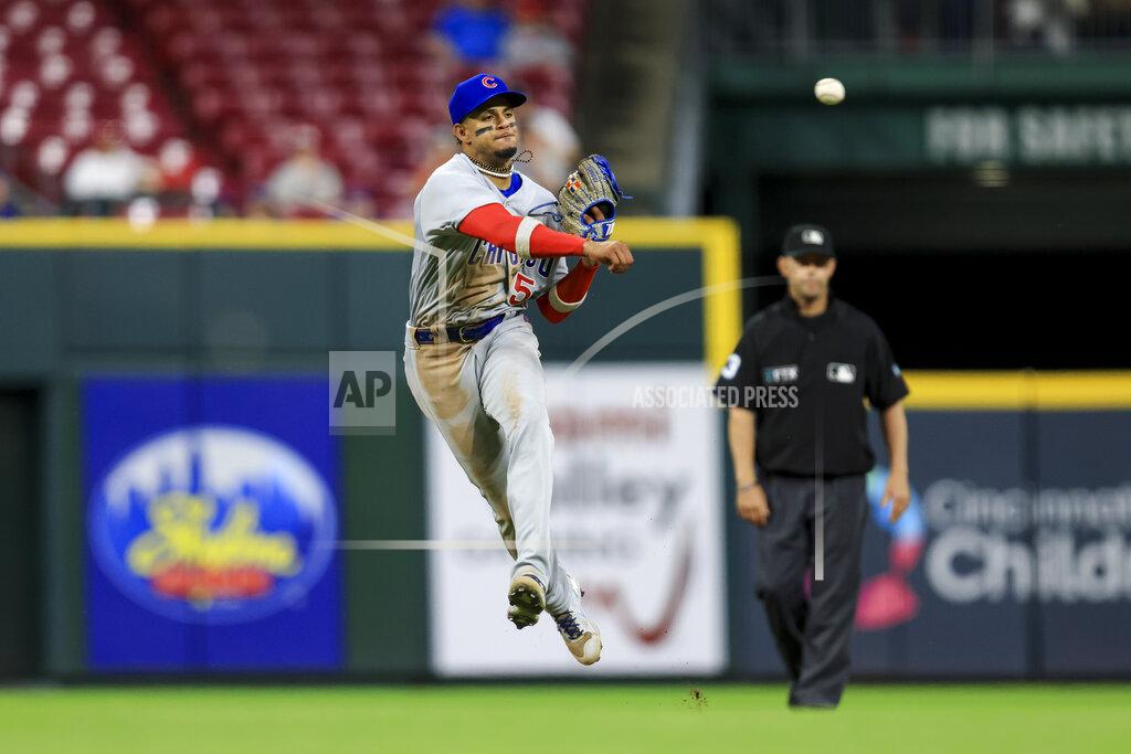 Aaron Doster Chicago Cubs' Christopher Morel fields the ball and throws out Cincinnati Reds' Nick Senzel at first base during the seventh inning of a baseball game in Cincinnati, Tuesday, May 24, 2022. The Cubs won 11-4. (AP Photo/Aaron Doster)