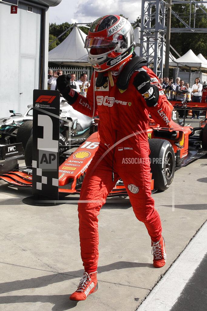 Luca Bruno Ferrari driver Charles Leclerc of Monaco celebrates after winning the Formula One Italy Grand Prix at the Monza racetrack, in Monza, Italy, Sunday, Sept. 8, 2019. (AP Photo/Luca Bruno)