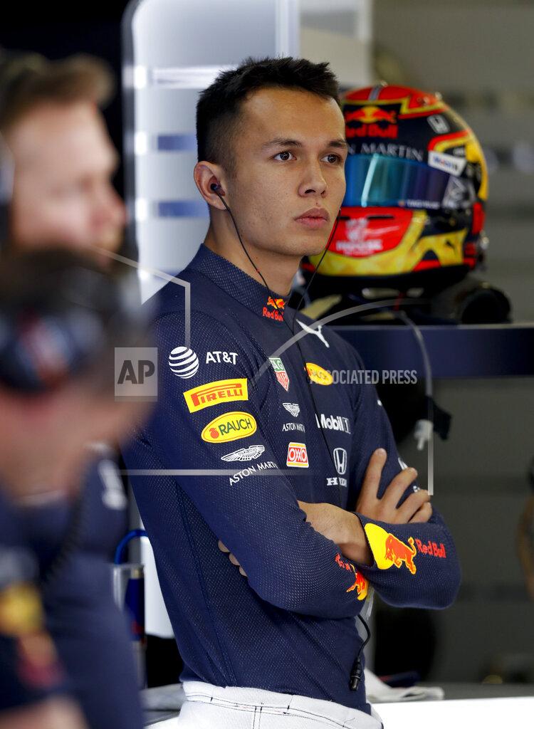 Red Bull driver Alexander Albon, of Thailand, stands in the pit lane during the second training session of the Formula One Mexico Grand Prix auto race at the Hermanos Rodriguez racetrack in Mexico City, Friday, Oct. 25, 2019. (AP Photo/Eduardo Verdugo)