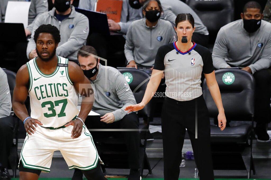 Michael Dwyer Referee Natalie Sago officiates behind Boston Celtics' Semi Ojeleye (37) during the first half of an NBA basketball game against the Memphis Grizzlies, Wednesday, Dec. 30, 2020, in Boston. (AP Photo/Michael Dwyer)
