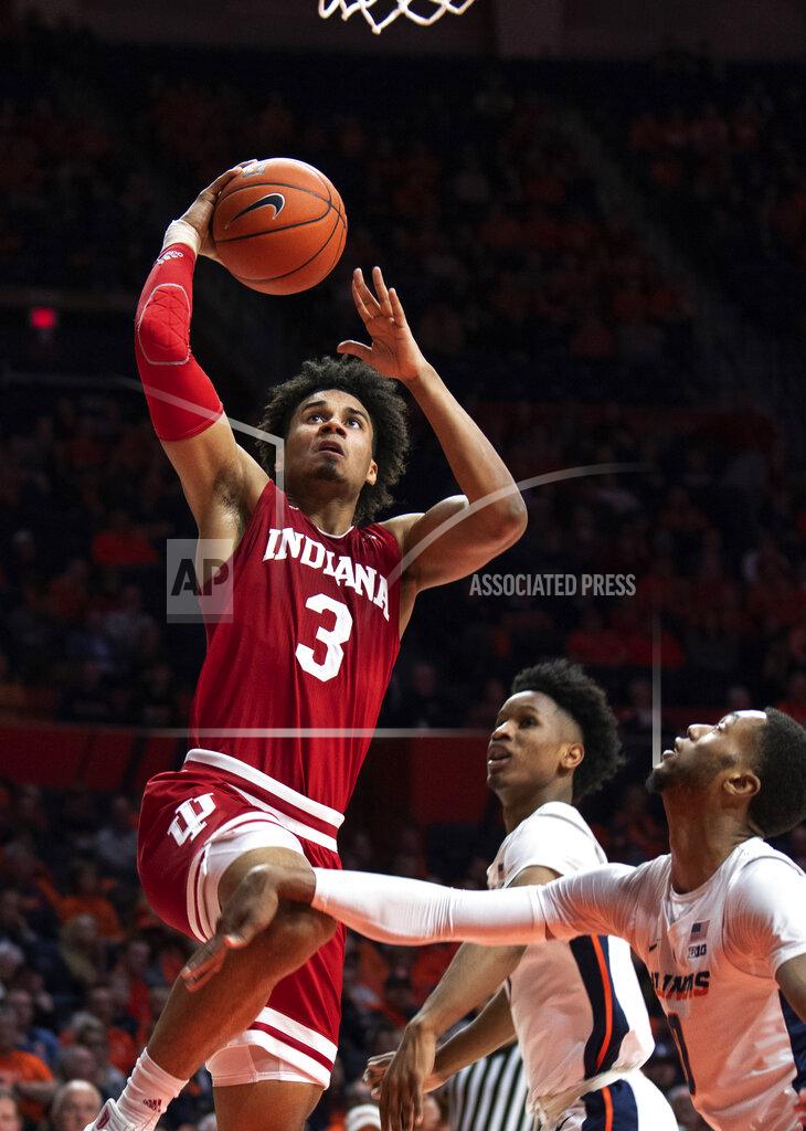 Stephen Haas Indiana forward Justin Smith (3) shoots against Illinois guard Alan Griffin (0) and guard Trent Frazier (1) during the second half of an NCAA college basketball game in Champaign, Ill., Thursday, March 7, 2019. (AP Photo/Stephen Haas)