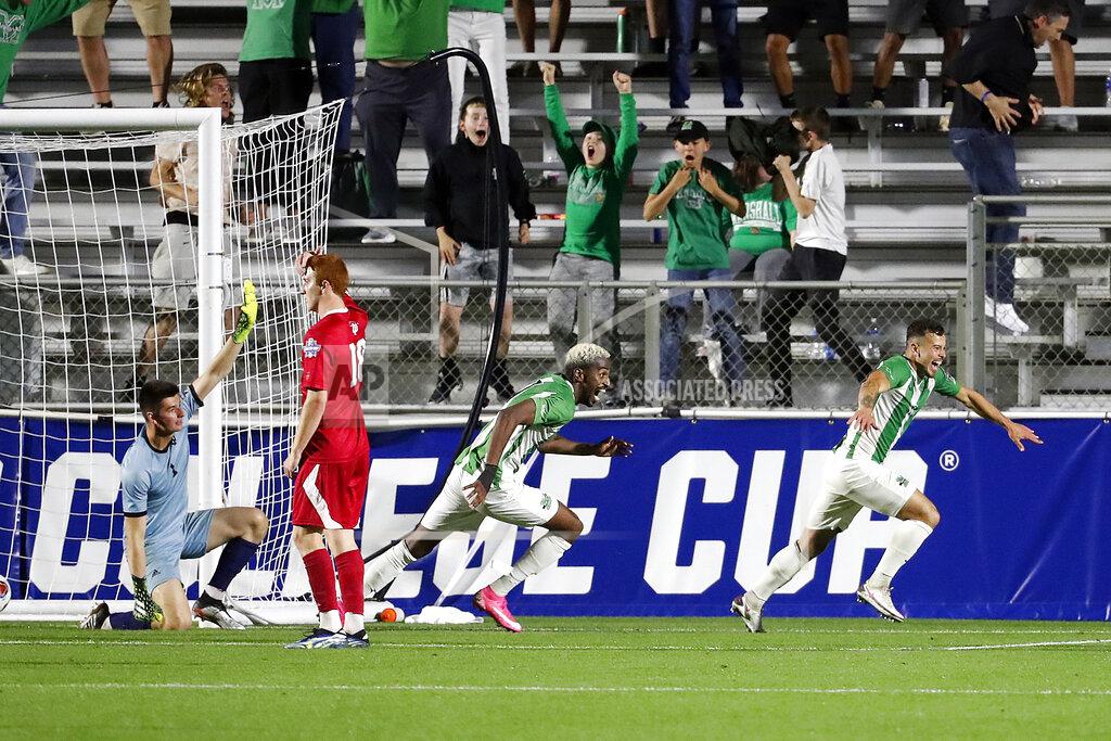 Karl B Deblaker Marshall's Jamil Roberts (11) celebrates his game-winning goal in overtime of the NCAA College Cup championship soccer match against Indiana in Cary, N.C., Monday, May 17, 2021. Marshall won 1-0 in overtime. (AP Photo/Karl B DeBlaker)