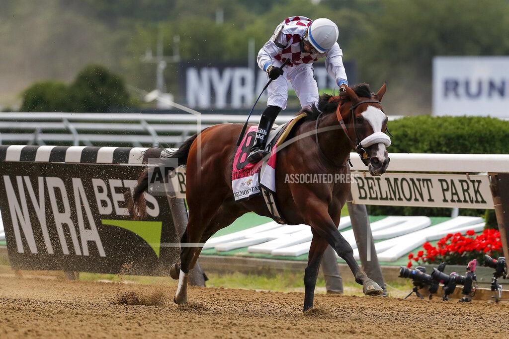 Seth Wenig Tiz the Law (8), with jockey Manny Franco up, crosses the finish line to win the152nd running of the Belmont Stakes horse race, Saturday, June 20, 2020, in Elmont, N.Y. (AP Photo/Seth Wenig)
