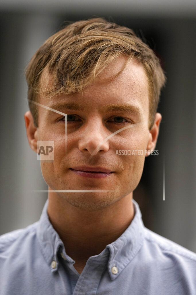 Frank Augstein Actor Luke Thallon, star of the play Camp Siegfried, poses for a photographer in front of the Old Vic theatre in London, Friday, Sept. 10, 2021. London's Old Vic Theatre is reopening at full capacity for the first time since the pandemic began. The show is “Camp Siegfried,” American writer Bess Wohl's play about a summer camp for Nazis on New York's Long Island. It's based on a real-life camp in the 1930s that indoctrinated young German-Americans into the ideas of the Third Reich, and depicts two teenagers whose burgeoning relationship collides with the insidious ideology of Nazism. (AP Photo/Frank Augstein)