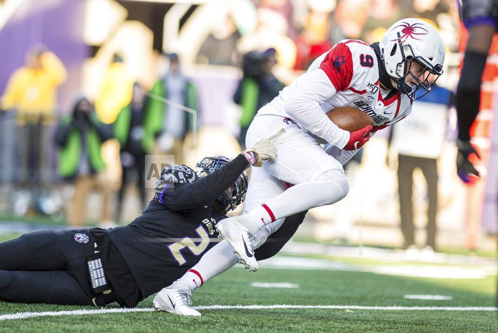 Daniel Lin Richmond wide receiver Charlie Fessler (9) fights for extra yards as he gets tackled by James Madison linebacker Dimitri Holloway (2) during the first half of an NCAA college football game in Harrisonburg, Va, Saturday, Nov. 16, 2019. (Daniel Lin/Daily News-Record via AP)