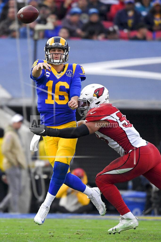 Mark J. Terrill Los Angeles Rams quarterback Jared Goff passes under pressure from Arizona Cardinals middle linebacker Jordan Hicks during second half of an NFL football game Sunday, Dec. 29, 2019, in Los Angeles. (AP Photo/Mark J. Terrill)