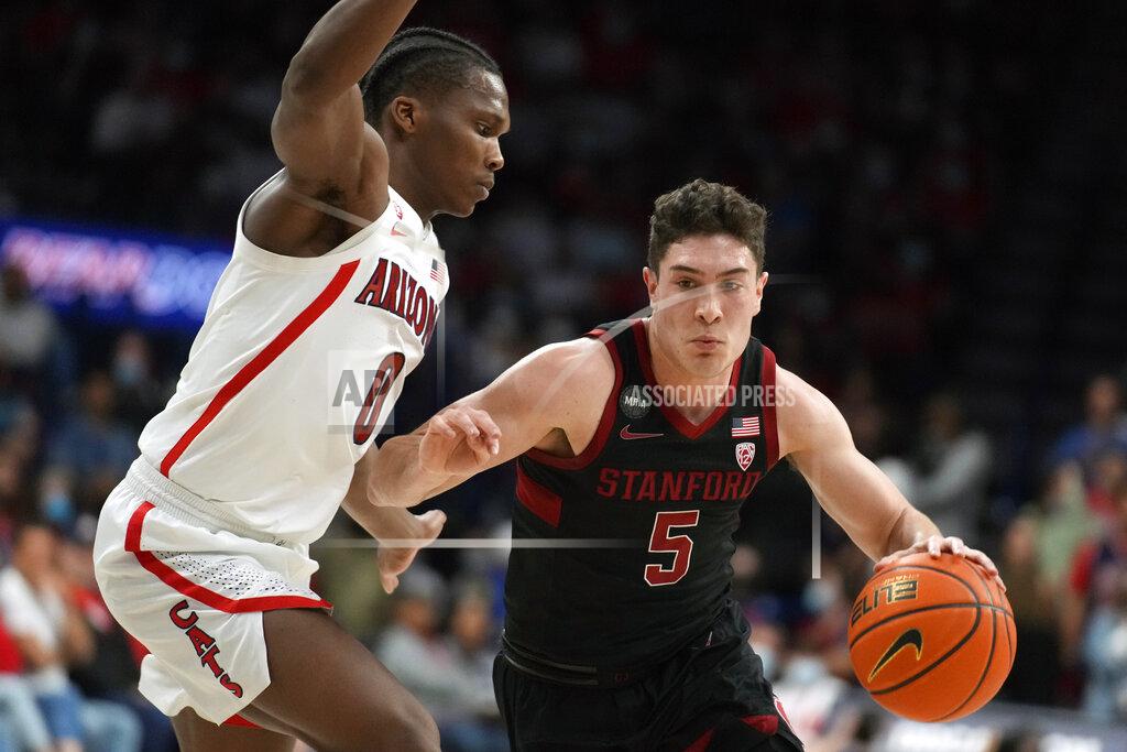 Rick Scuteri Stanford guard Michael O'Connell (5) drives on Arizona guard Bennedict Mathurin during the first half of an NCAA college basketball game Thursday, March 3, 2022, in Tucson, Ariz. (AP Photo/Rick Scuteri)