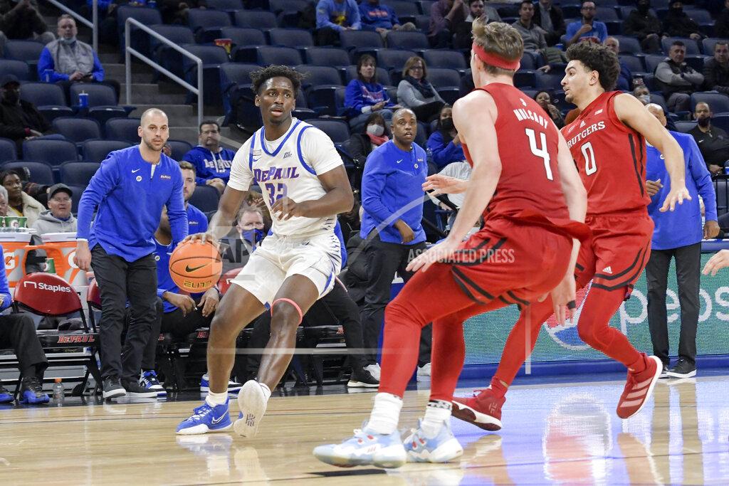 Mark Black DePaul's David Jones (32) looks for an opening against Rutgers during the second half of an NCAA college basketball game Thursday, Nov. 18, 2021, in Chicago. (AP Photo/Mark Black)