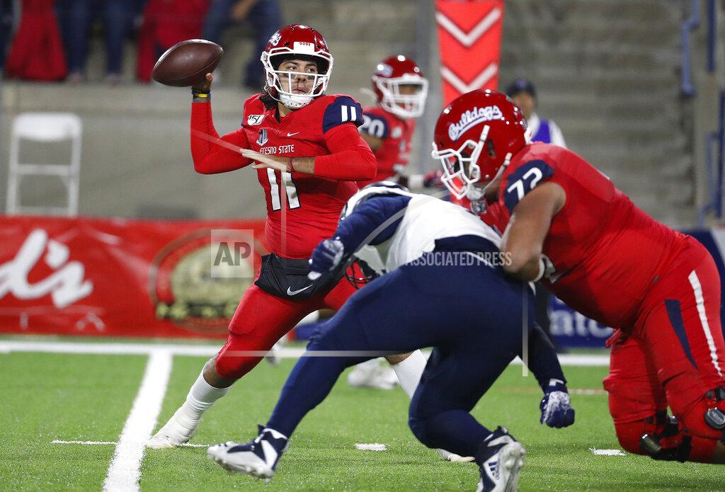 Gary Kazanjian Fresno State quarterback Jorge Reyna drops back to pass during the first half of the team's NCAA college football game against Nevada in Fresno, Calif., Saturday, Nov. 23, 2019. (AP Photo/Gary Kazanjian)
