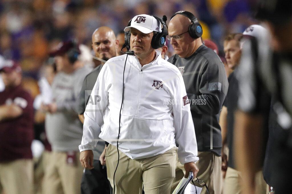 Gerald Herbert Texas A&M coach Jimbo Fisher walks along the sideline during the first half of the team's NCAA college football game against Texas A&M in Baton Rouge, La., Saturday, Nov. 30, 2019. LSU won 50-7. (AP Photo/Gerald Herbert)
