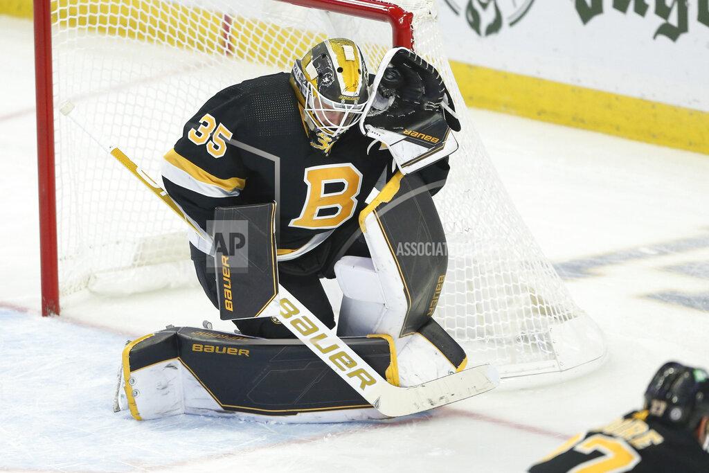 Joshua Bessex Boston Bruins goaltender Linus Ullmark (35) catches a shot during the third period of an NHL hockey game against the Buffalo Sabres, Friday, Oct. 22, 2021, in Buffalo, N.Y. (AP Photo/Joshua Bessex)