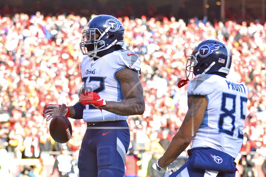 Ed Zurga Tennessee Titans' Derrick Henry (22) reacts after running for a touchdown during the first half of the NFL AFC Championship football game against the Kansas City Chiefs Sunday, Jan. 19, 2020, in Kansas City, MO. (AP Photo/Ed Zurga)