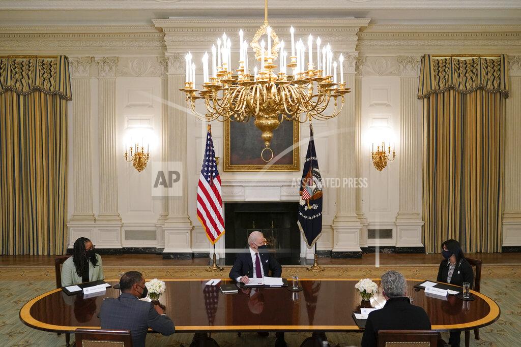 Patrick Semansky President Joe Biden participates in a roundtable discussion on a coronavirus relief package in the State Dining Room of the White House in Washington, Friday, March 5, 2021. (AP Photo/Patrick Semansky)