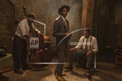 David Lee This image released by Netflix shows Michael Potts, from left, Chadwick Boseman and Colman Domingo in "Ma Rainey's Black Bottom." (David Lee/Netflix via AP)