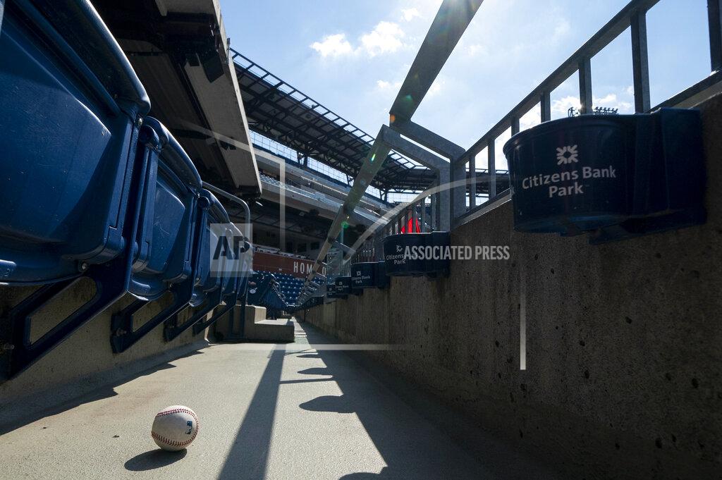 Chris Szagola A foul ball that was hit into the stands sits on the floor of an empty stadium during the eighth inning of a baseball game between the Miami Marlins and the Philadelphia Phillies, Sunday, July 26, 2020, in Philadelphia. (AP Photo/Chris Szagola)