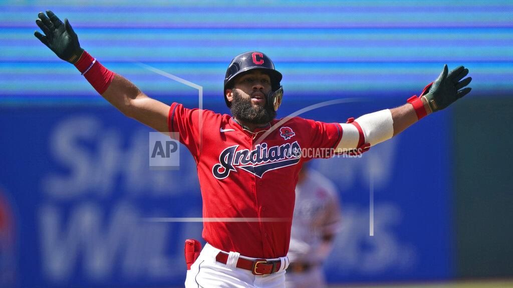 Tony Dejak Cleveland Indians' Amed Rosario celebrates after hitting a solo home run in the first inning of the first baseball game of a doubleheader against the Chicago White Sox, Monday, May 31, 2021, in Cleveland. (AP Photo/Tony Dejak)