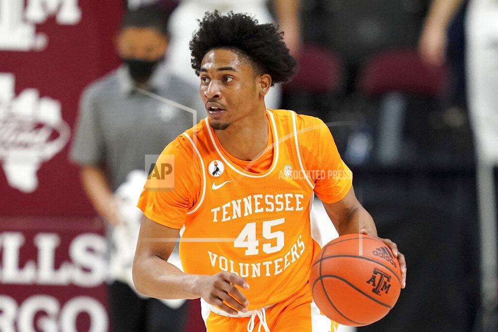 Sam Craft FILE - In this Jan. 9, 2021, file photo, Tennessee guard Keon Johnson brings the ball up against Texas A&M during an NCAA college basketball game in College Station, Texas. Johnson was chosen in the first round of the NBA draft Thursday, July 29, 2021. (AP Photo/Sam Craft, File)