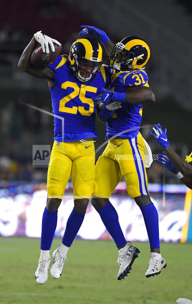 Mark J. Terrill Los Angeles Rams cornerback Kevin Peterson, left, celebrates his interception with Darious Williams (31) during the second half of an NFL preseason football game against the Denver Broncos Saturday, Aug. 24, 2019, in Los Angeles. (AP Photo/Mark J. Terrill)
