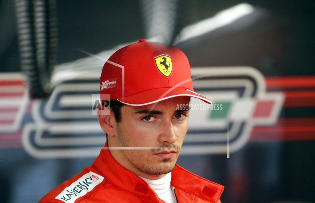 Luca Bruno Ferrari driver Charles Leclerc of Monaco looks on in the pit lane after the first free practice at the 'Sochi Autodrom' Formula One circuit, in Sochi, Russia, Friday, Sept. 27, 2019. The Formula one race will be held on Sunday. (AP Photo/Luca Bruno)
