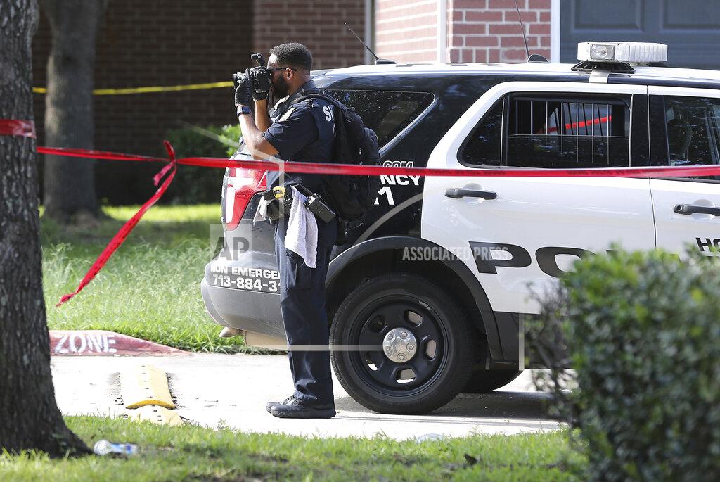Elizabeth Conley Police investigate a shooting Timber Ridge Apartments in Houston on Monday, Sept. 20, 2021. Authorities say a Houston police officer was killed and another was wounded during a shooting that also killed a 31-year-old man who the officers were attempting to arrest. (Elizabeth Conley/Houston Chronicle via AP)