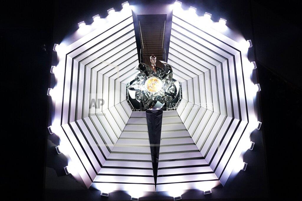 Morry Gash Naomi Osaka lights the Olympic cauldron during the opening ceremony at the Olympic Stadium at the 2020 Summer Olympics, Friday, July 23, 2021, in Tokyo. (AP Photo/Morry Gash)