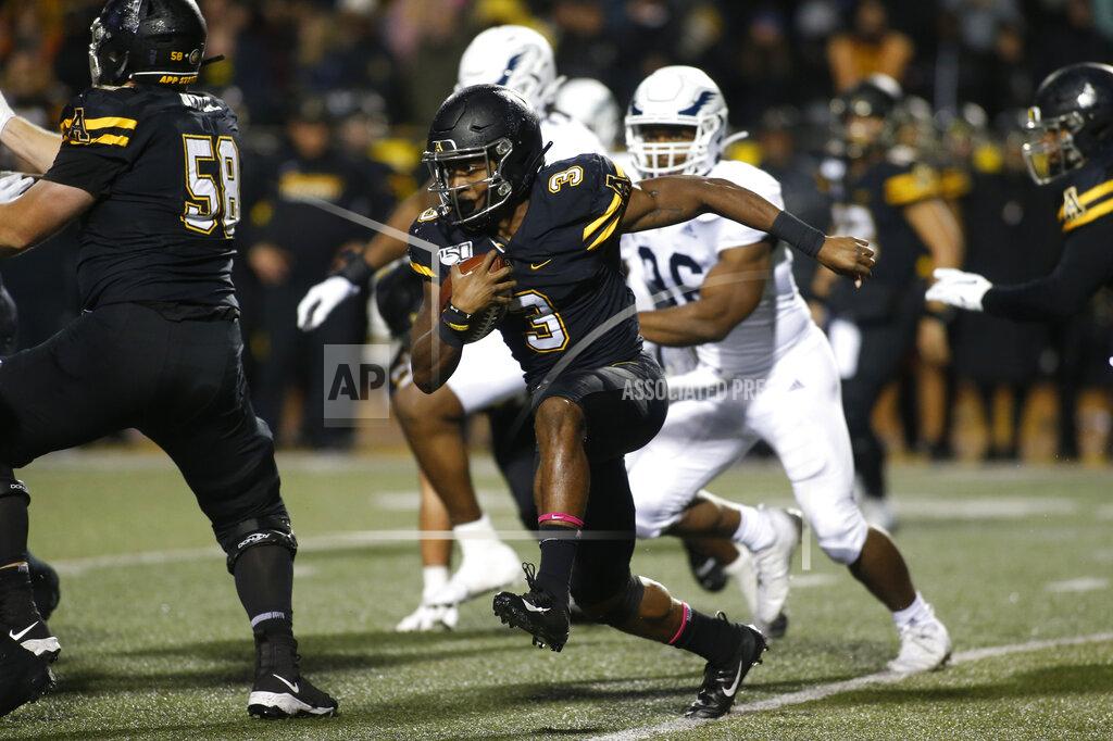 Brian Blanco Appalachian State running back Darrynton Evans (3) runs for a first down during the first half of the team's NCAA college football game against Georgia Southern on Thursday, Oct. 31, 2019, in Boone, N.C. (AP Photo/Brian Blanco)