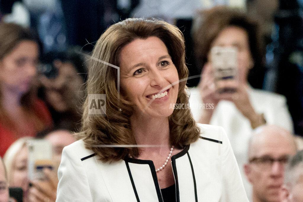 Andrew Harnik FILE - Northrop Grumman President and Chief Operating Officer Kathy Warden speaks in the East Room of the White House in Washington on July 19, 2018. At $19.5 million, Warden was the fifth highest-paid female CEO for 2021, as calculated by The Associated Press and Equilar, an executive data firm. (AP Photo/Andrew Harnik, File)