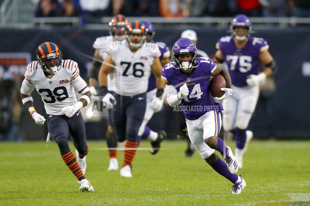 Charles Rex Arbogast Minnesota Vikings wide receiver Stefon Diggs (14) runs with the ball as Chicago Bears free safety Eddie Jackson (39) gives chase during the second half of an NFL football game Sunday, Sept. 29, 2019, in Chicago. (AP Photo/Charles Rex Arbogast)
