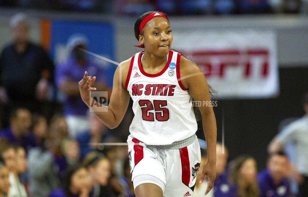 Ben Mckeown North Carolina State's Kayla Jones (25) reacts after a 3-point basket during the first half of a college basketball game against Kansas State in the second round of the NCAA tournament in Raleigh, N.C., Monday, March 21, 2022. (AP Photo/Ben McKeown)