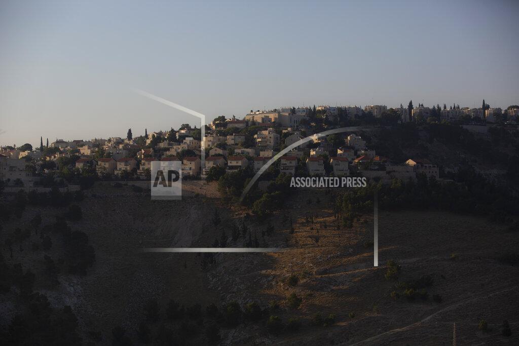 Sebastian Scheiner This Monday, June 29, 2020 photo shows the Israeli settlement of Maale Adumim, in the West Bank. The U.N.'s human rights chief Michelle Bachelet said that Israel's plan to begin annexing parts of the occupied West Bank would have "disastrous" consequences for the region, issuing her dire warning as senior U.S. and Israeli officials were meeting in Jerusalem trying to finalize the move. (AP Photo/Sebastian Scheiner)