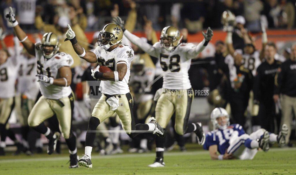 Mike Groll FILE - In this Feb. 7, 2010, file photo, New Orleans Saints cornerback Tracy Porter (22) reacts as he returns an interception 74 yards for a touchdown against the Indianapolis Colts during the second half of the NFL Super Bowl XLIV football game, in Miami. As part of its celebration of its 100th season, the NFL is designating a Game of the Week, each chosen to highlight a classic matchup. For this week, it is the Colts-Saints game. (AP Photo/Mike Groll, File)