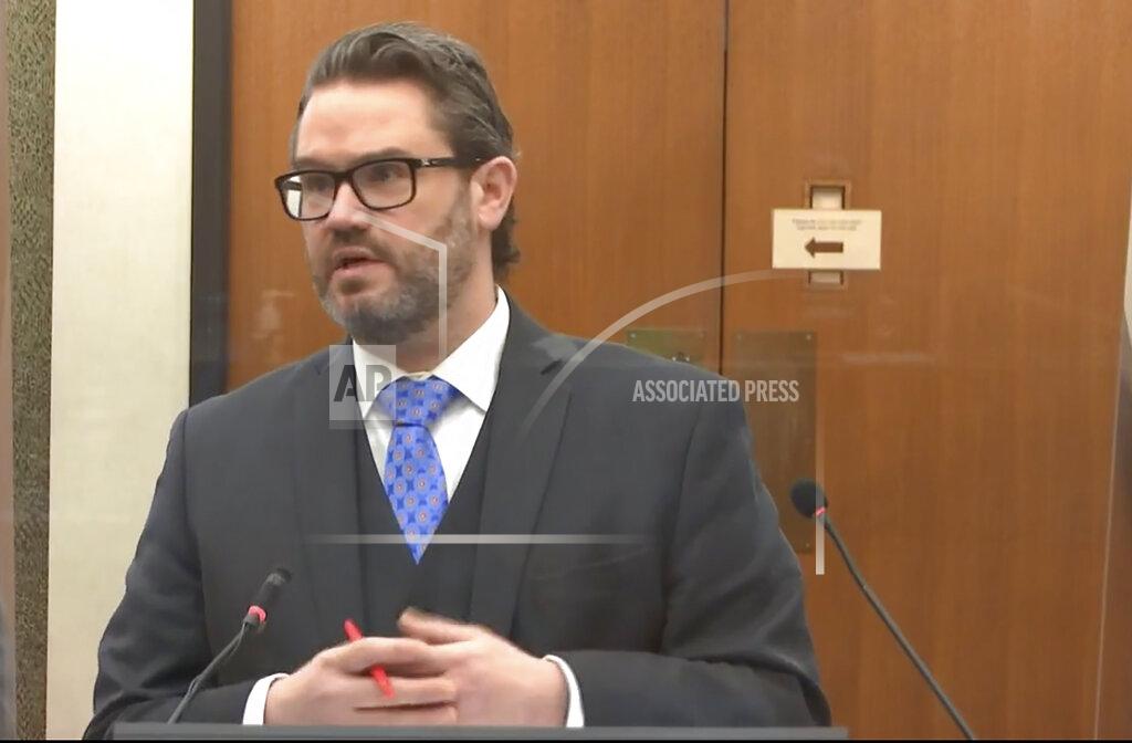 Uncredited In this image from video, defense attorney Eric Nelson questions Dr. David Fowler as Hennepin County Judge Peter Cahill presides, Wednesday, April 14, 2021, in the trial of former Minneapolis police Officer Derek Chauvin at the Hennepin County Courthouse in Minneapolis, Minn. Chauvin is charged in the May 25, 2020 death of George Floyd. (Court TV via AP, Pool)