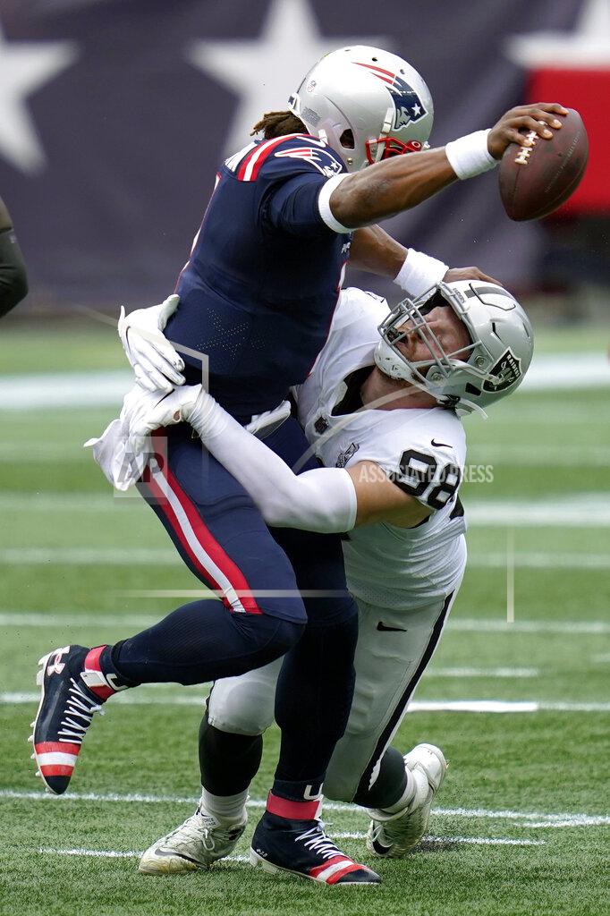 Charles Krupa Las Vegas Raiders defensive end Maxx Crosby (98) sacks New England Patriots quarterback Cam Newton in the first half of an NFL football game, Sunday, Sept. 27, 2020, in Foxborough, Mass. (AP Photo/Charles Krupa)