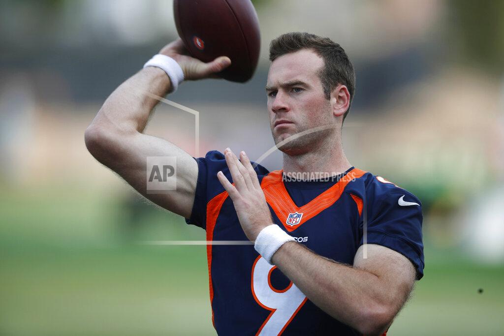 David Zalubowski Denver Broncos quarterback Kevin Hogan warms up during an NFL football training practice at the team's headquarters Tuesday, July 30, 2019, in Englewood, Colo. (AP Photo/David Zalubowski)